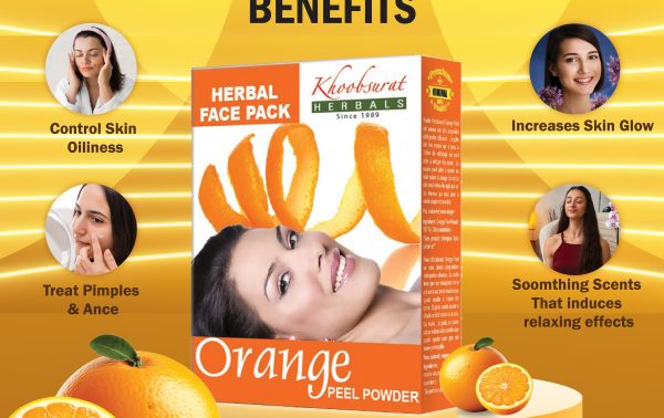 Woman applying orange peel herbal face pack for glowing skin